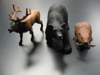 Elk, bear and beaver figurines